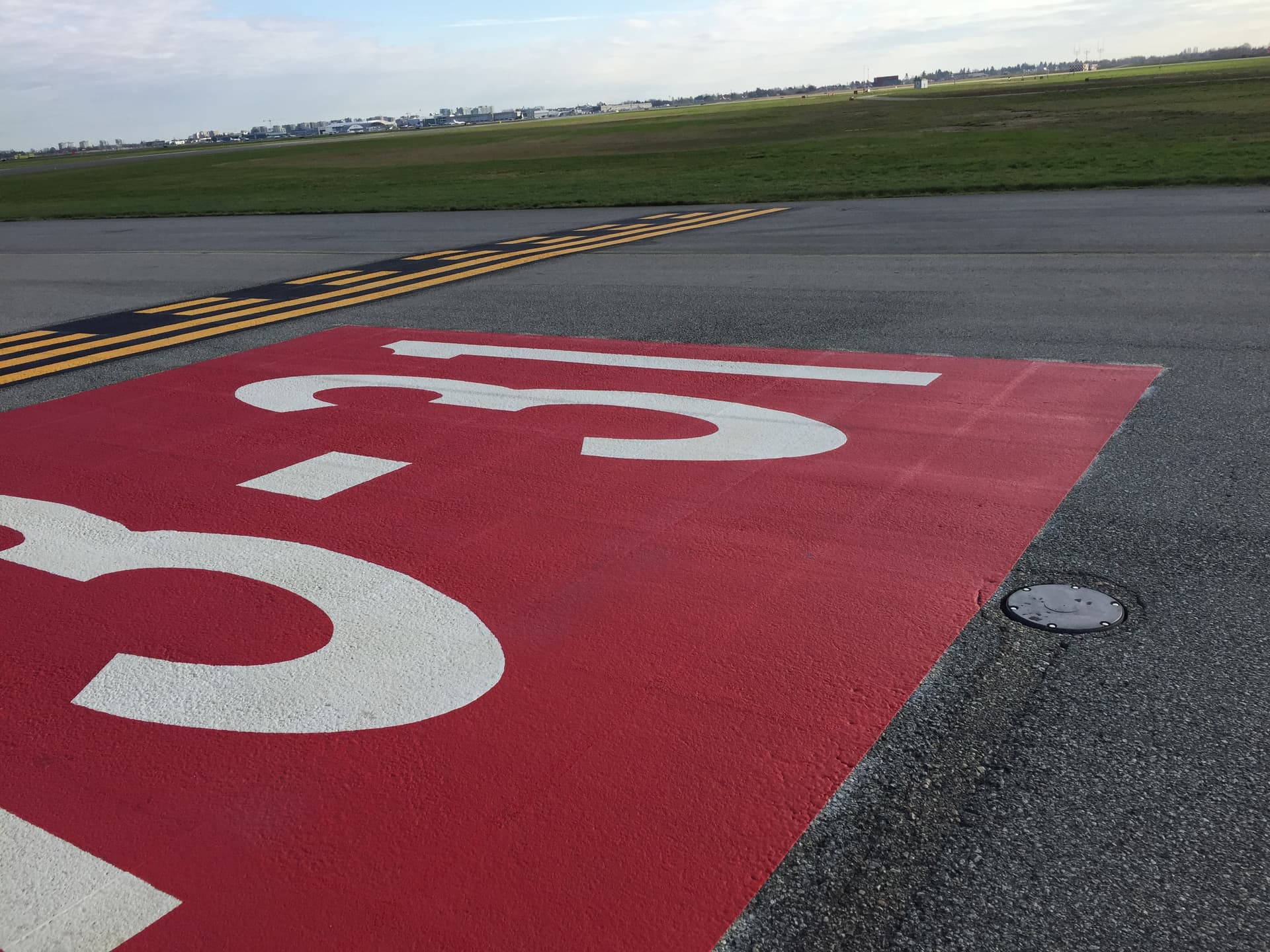Airport pavement marking specified for apron and airside service area marking — an airside service road