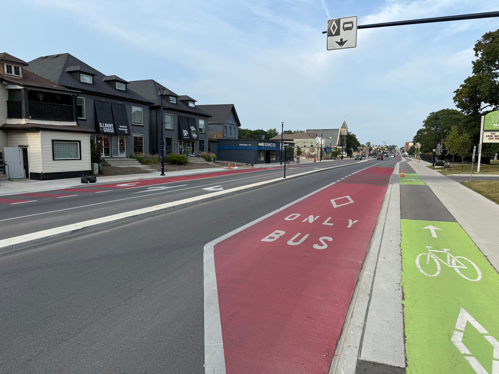 Coloured bike lane specified for protected cycling infrastructure — a downtown bike corridor