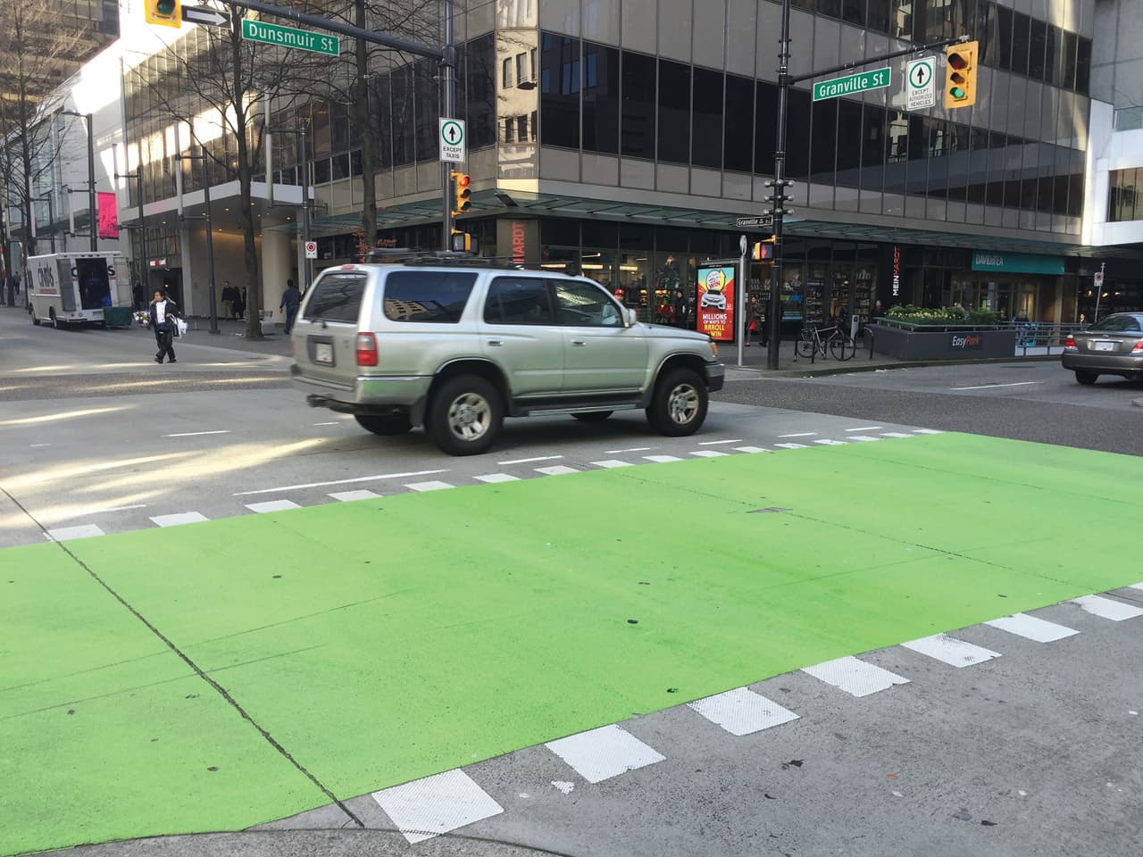 Coloured bike lane specified for protected cycling infrastructure — a multi-use path approach