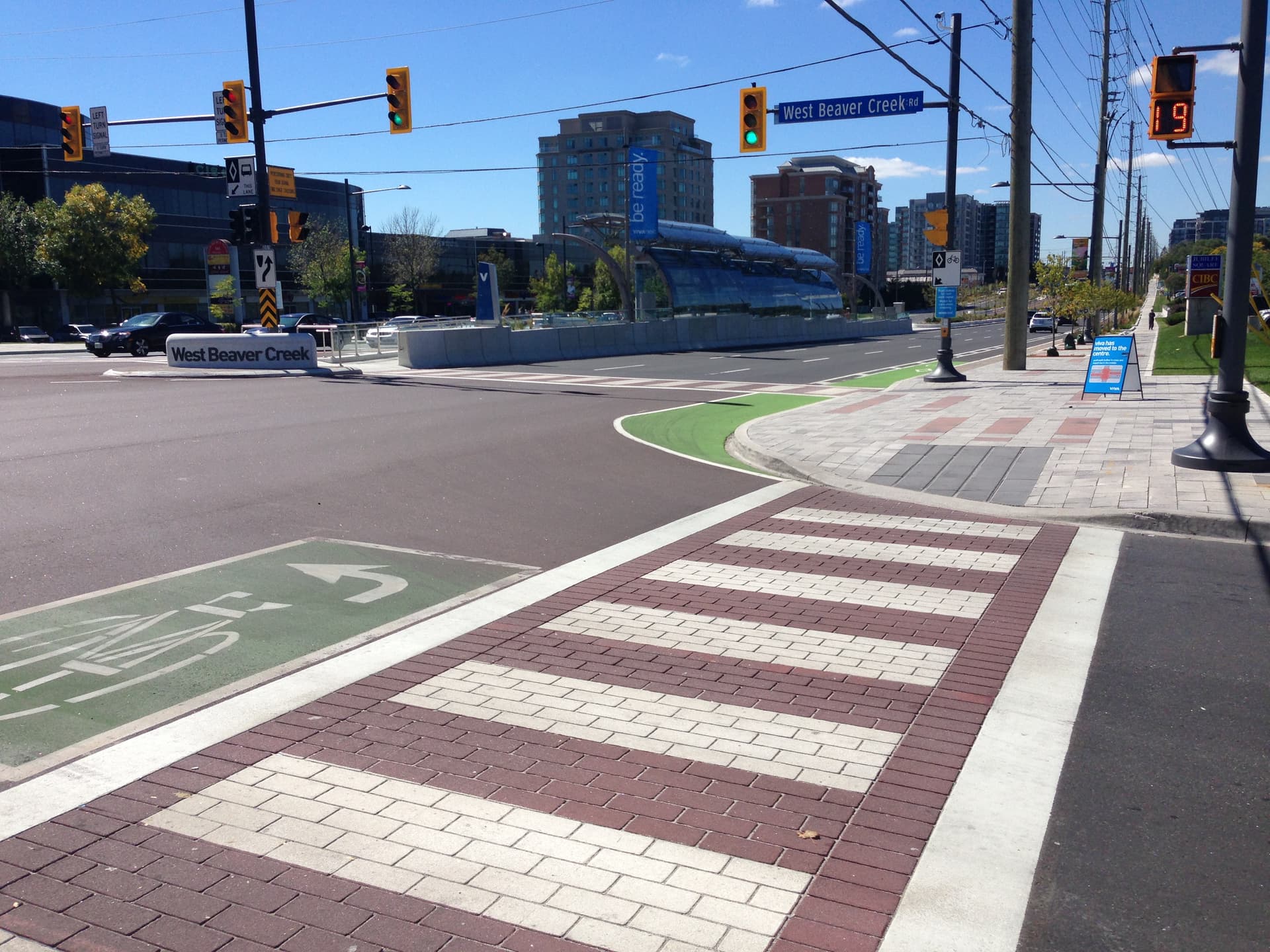 High-visibility decorative crosswalk with TrafficPatternsXD preformed thermoplastic — pedestrian safety surface for Vision Zero Canadian streetscape