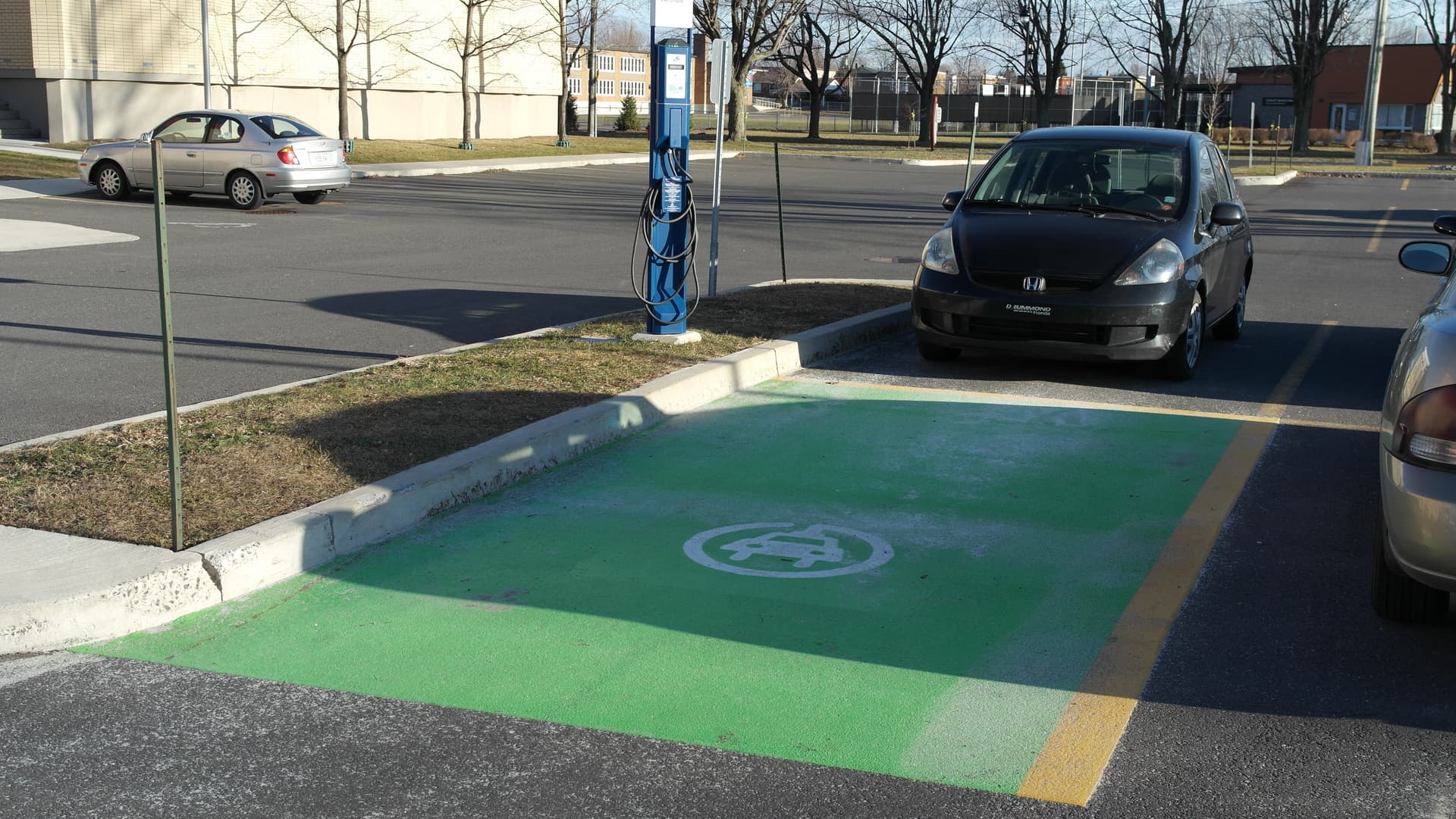 Parking Lots — Durable stall markings, wayfinding colour, and surface rejuv