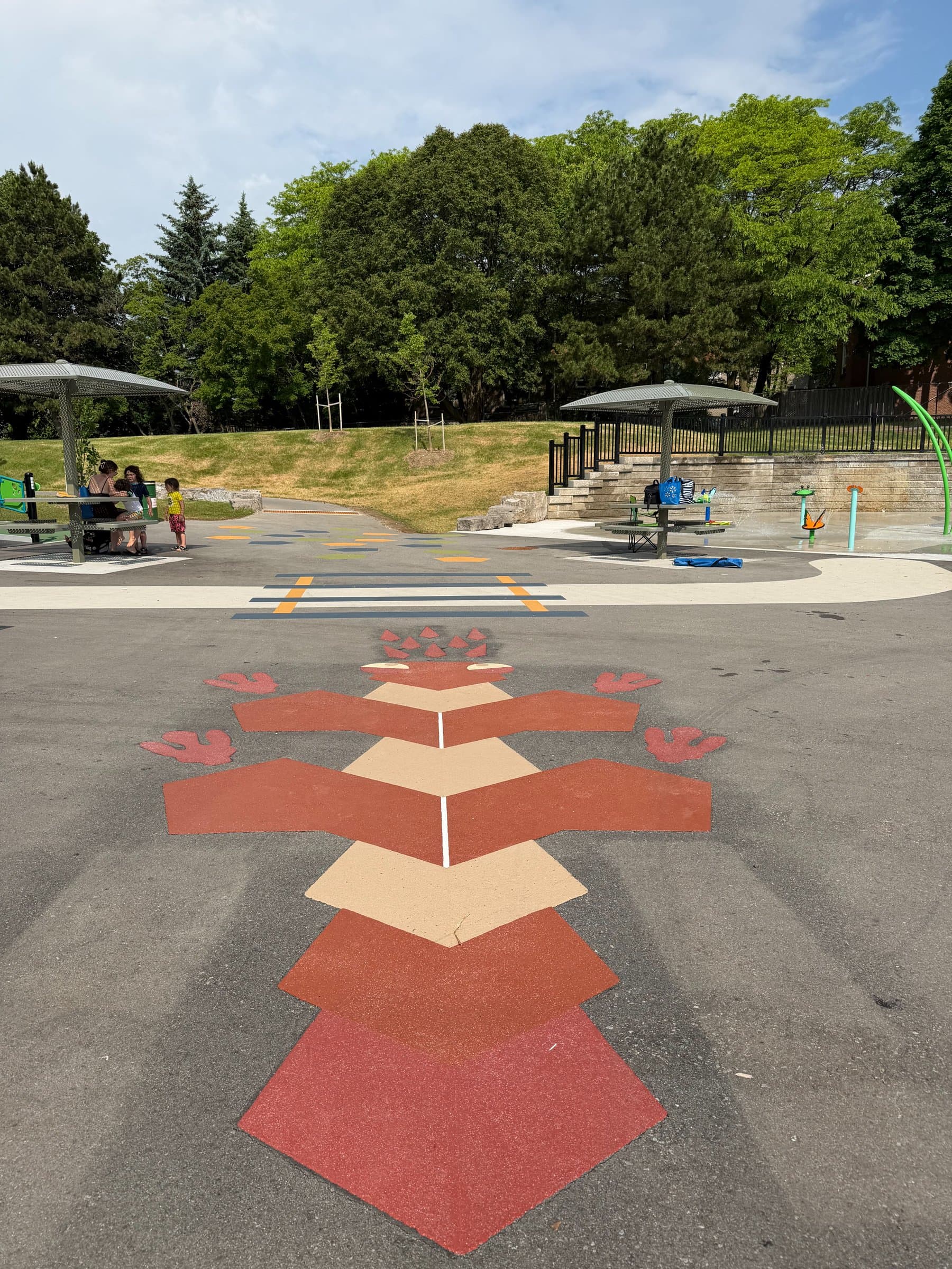 Decorative pathway paving at a greenway connection in Canada — installed by HUB Surface Systems