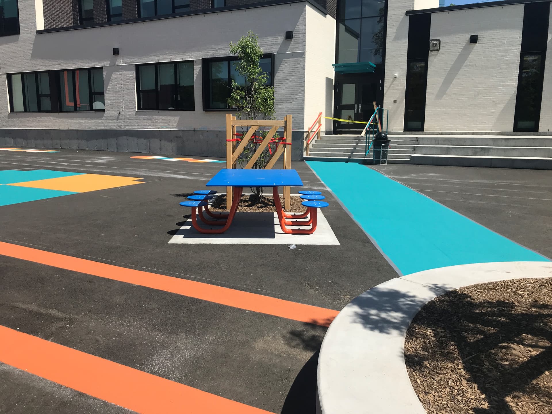 Playgrounds — Vibrant, slip-resistant playground surface graphics that sta