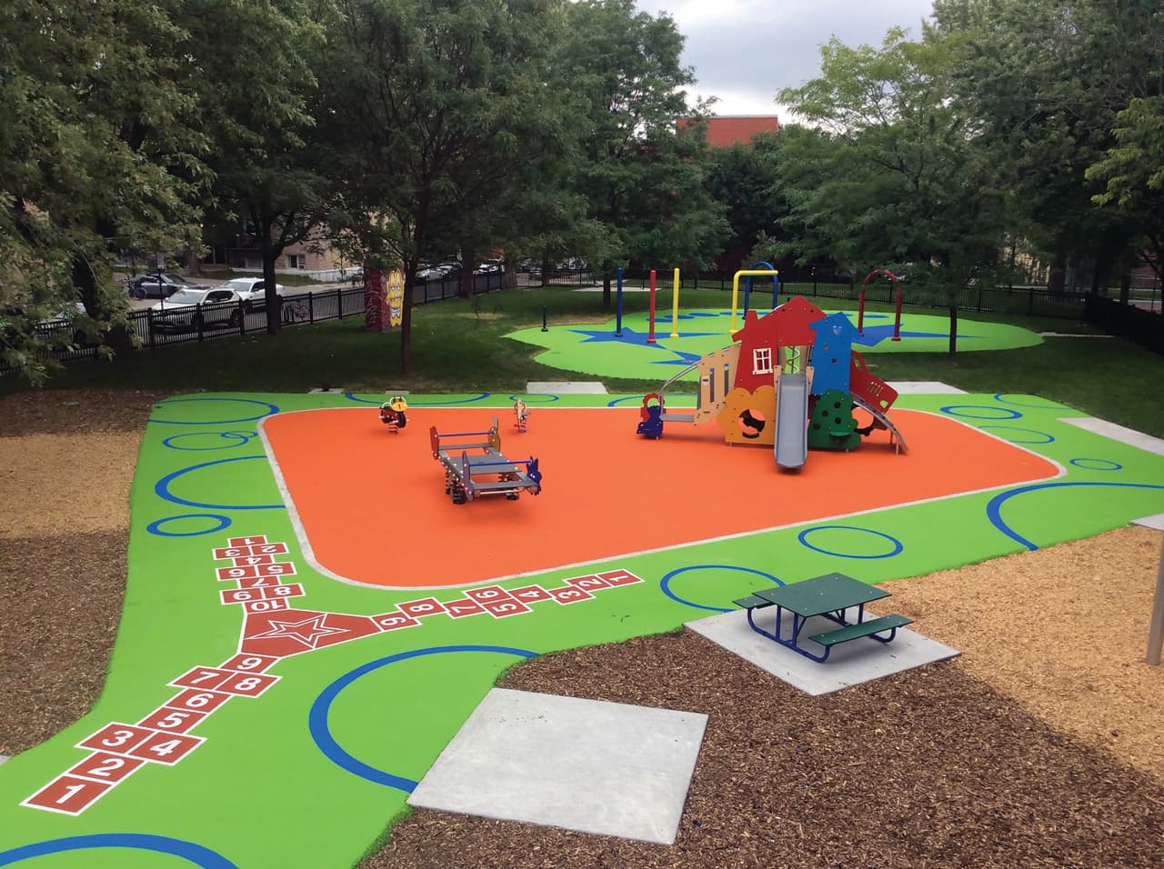 HUB Surface Systems playground surface graphics — play surfaces and schoolyard games at a daycare courtyard
