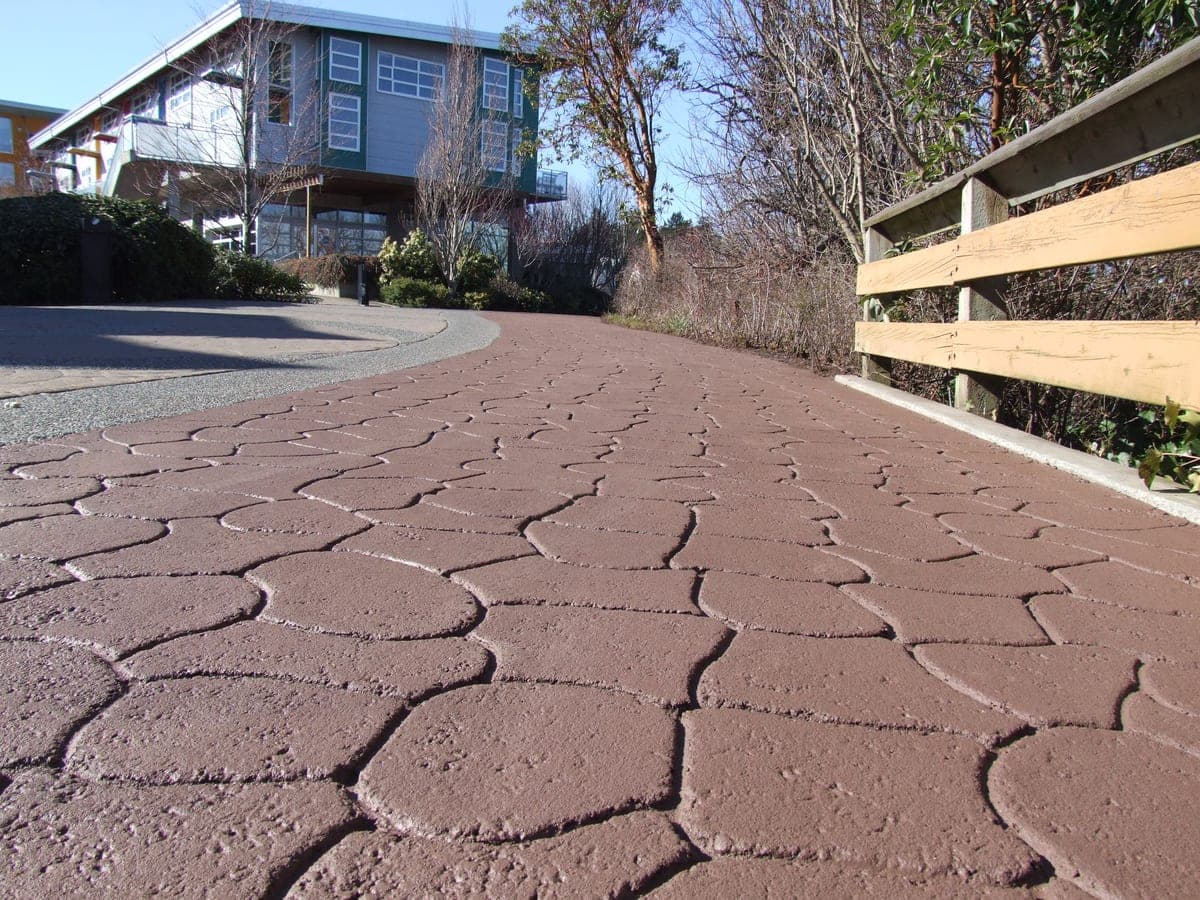 Why Stamped Asphalt Driveways Outperform Interlocking Stone (And Look Better Too)