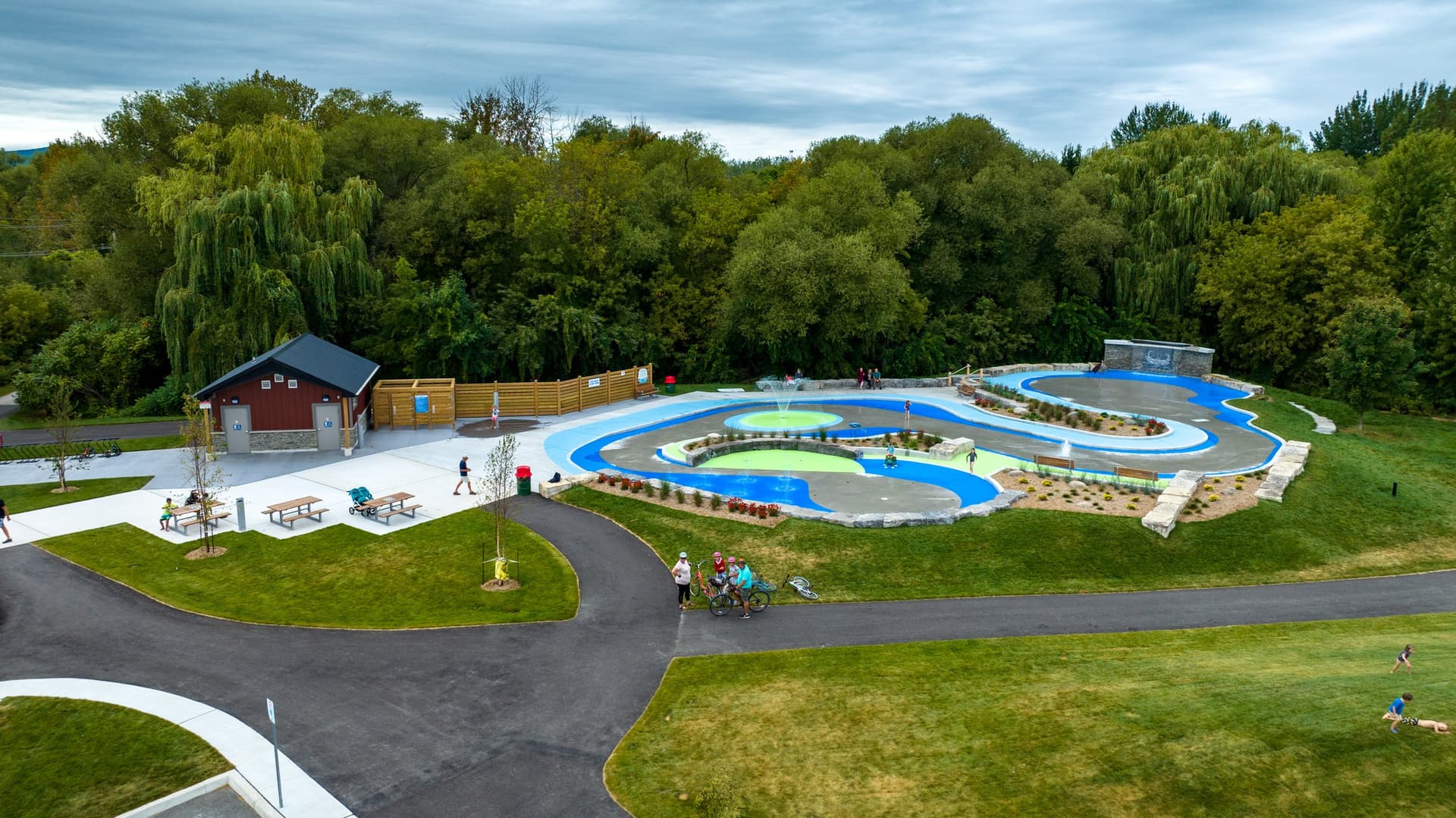 Splash pad surfacing installation in Canada: wet play surfaces with slip resistance at a community water play area