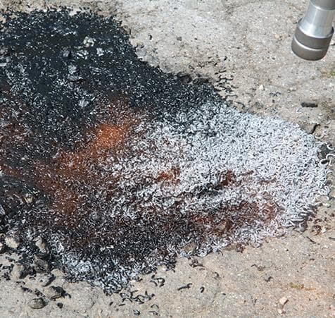 AggreFill — Pre-coated aggregate filler for larger potholes up to 1 m². Combined with ChipFill for permanent repair.
