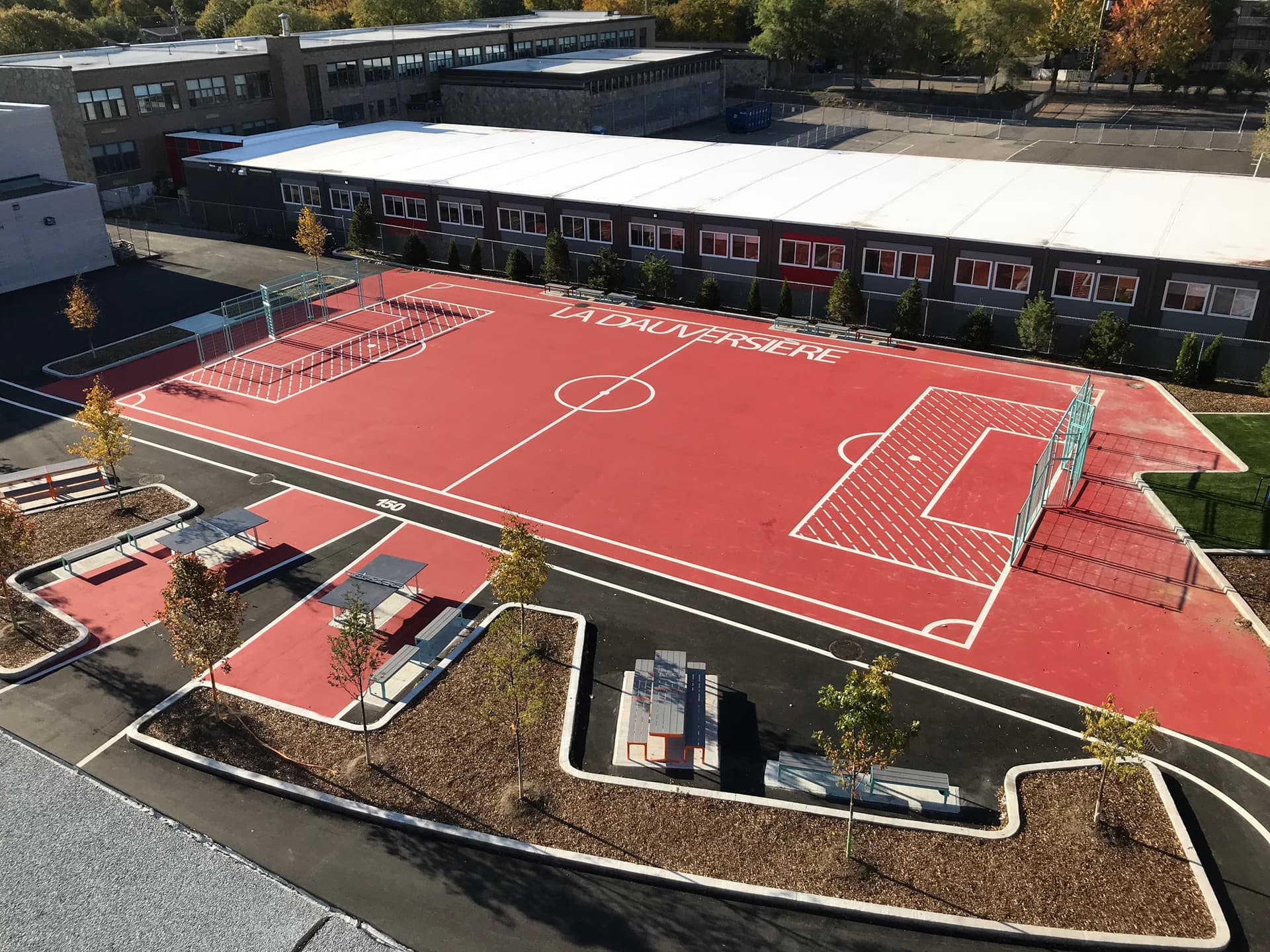 StreetBond pavement coating specified for long-life colour on asphalt and concrete — a sport court