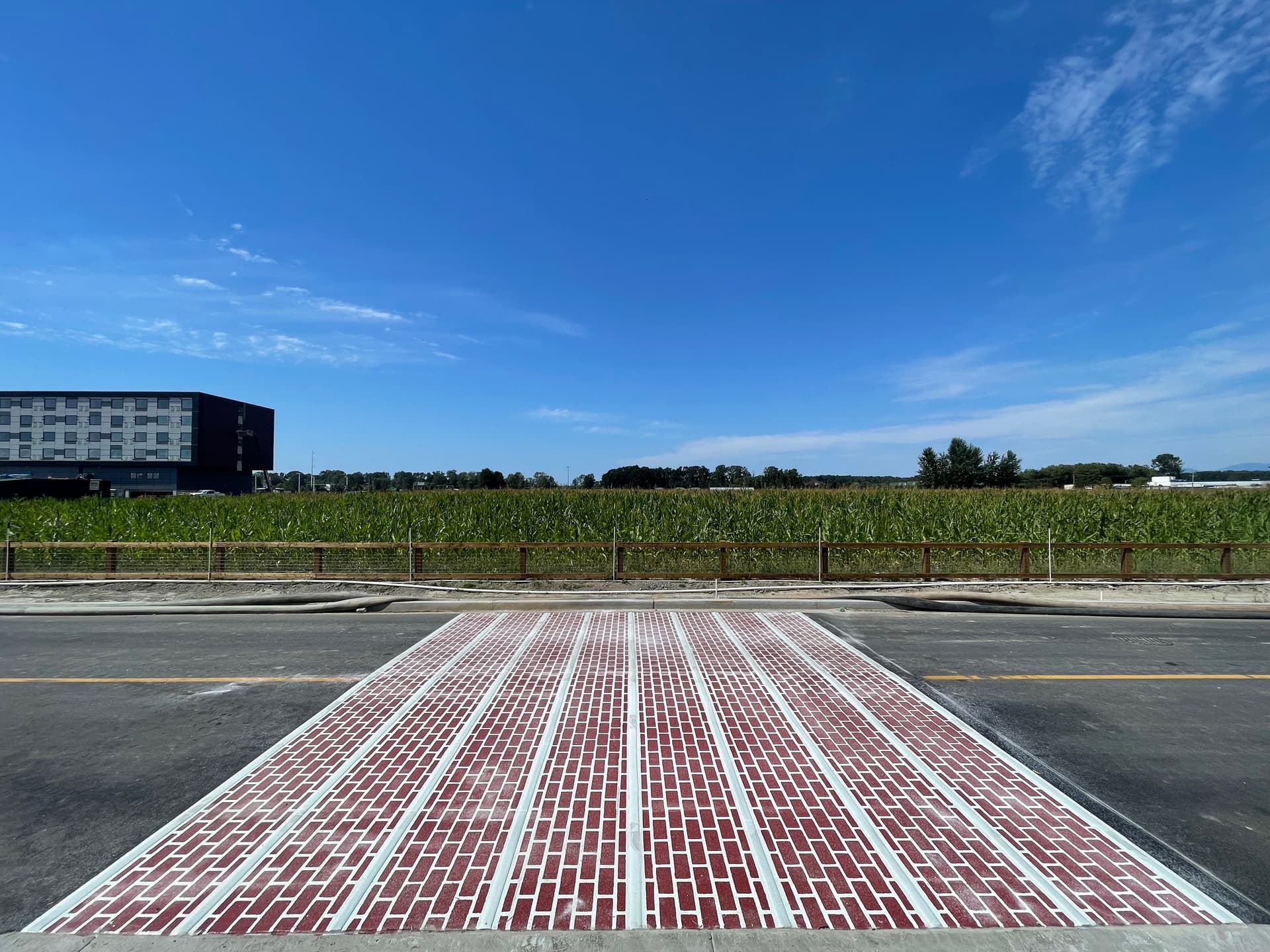TrafficPatterns thermoplastic pavement marking specified for decorative, durable pattern paving — a main street corridor