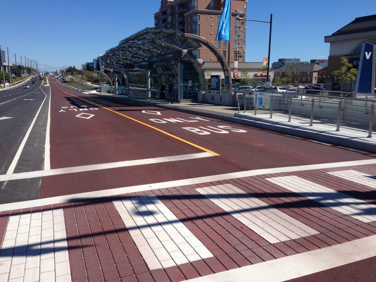 TrafficPatternsXD aggregate-reinforced preformed thermoplastic — BRT bus-only corridor with high-durability crosswalk, Ontario transit environment