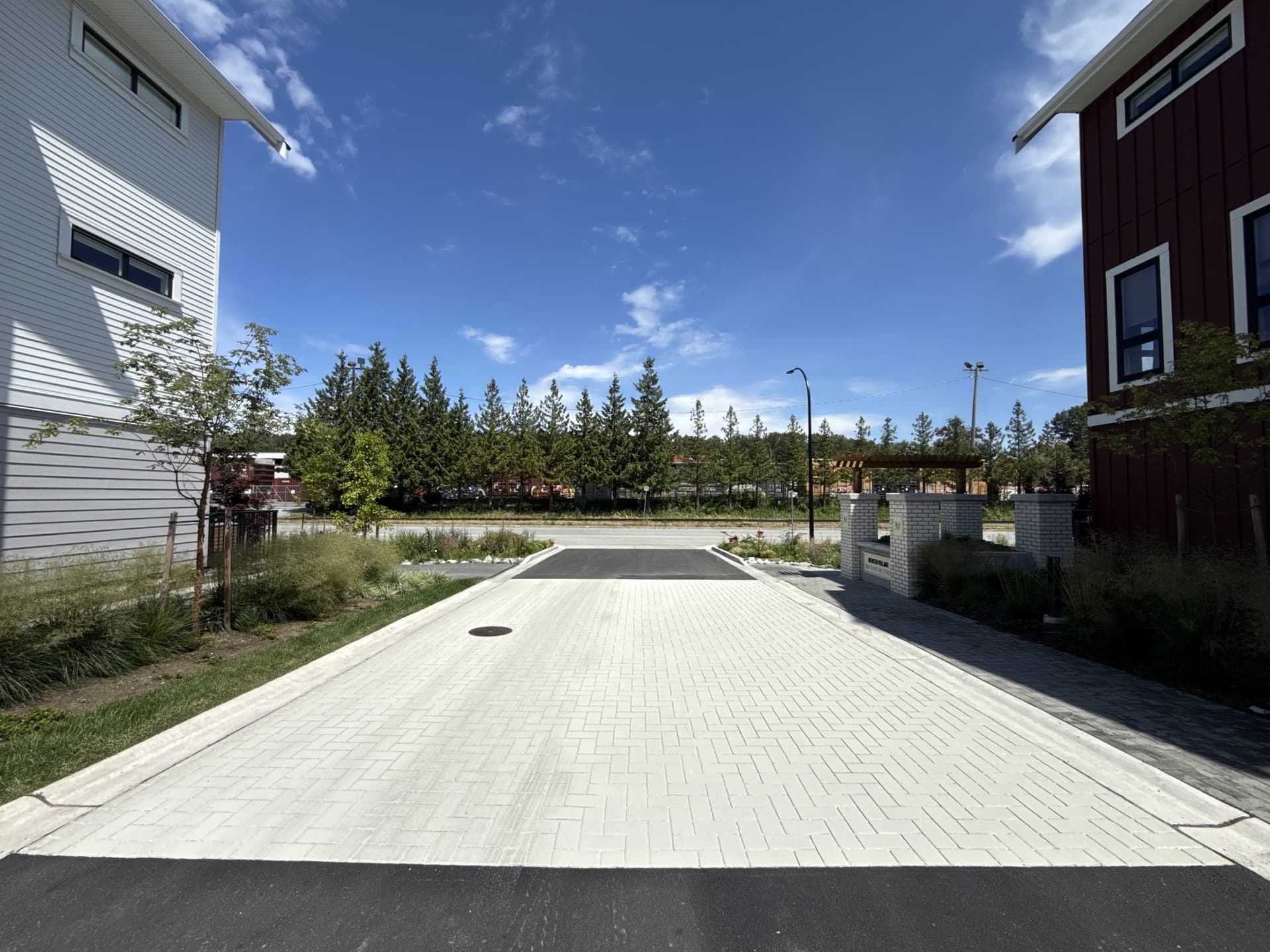 Townhome community paving installation in Canada: shared drive aisles and common areas at a multi-family courtyard