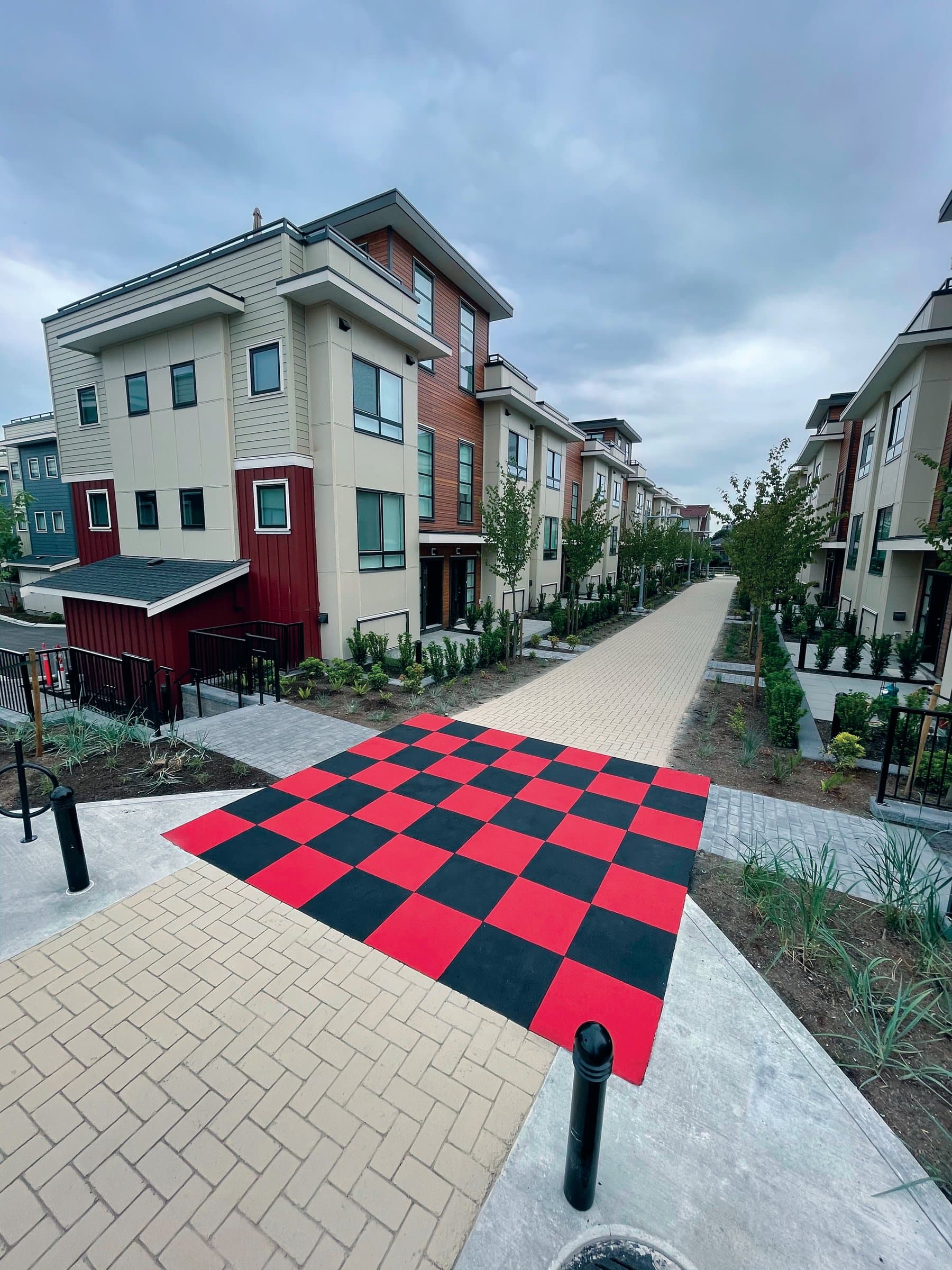Townhome community paving installation in Canada: shared drive aisles and common areas at a condominium drive aisle