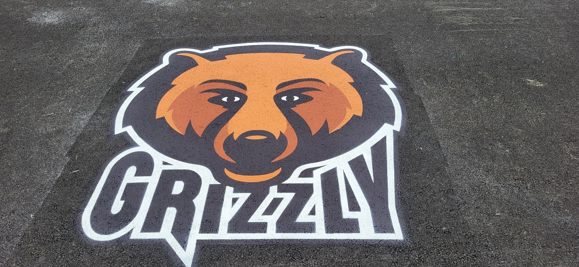 DecoMark decorative pavement graphics in custom preformed thermoplastic graphics — a branded intersection, Canada