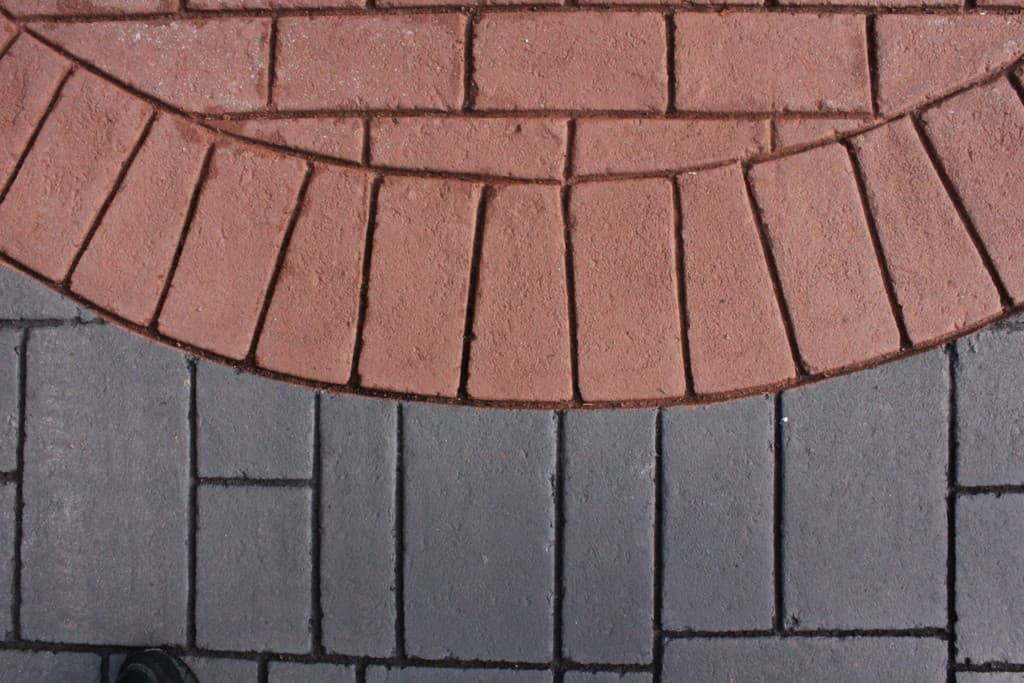 StreetPrint stamped asphalt at a park pathway in Canada — installed by HUB Surface Systems