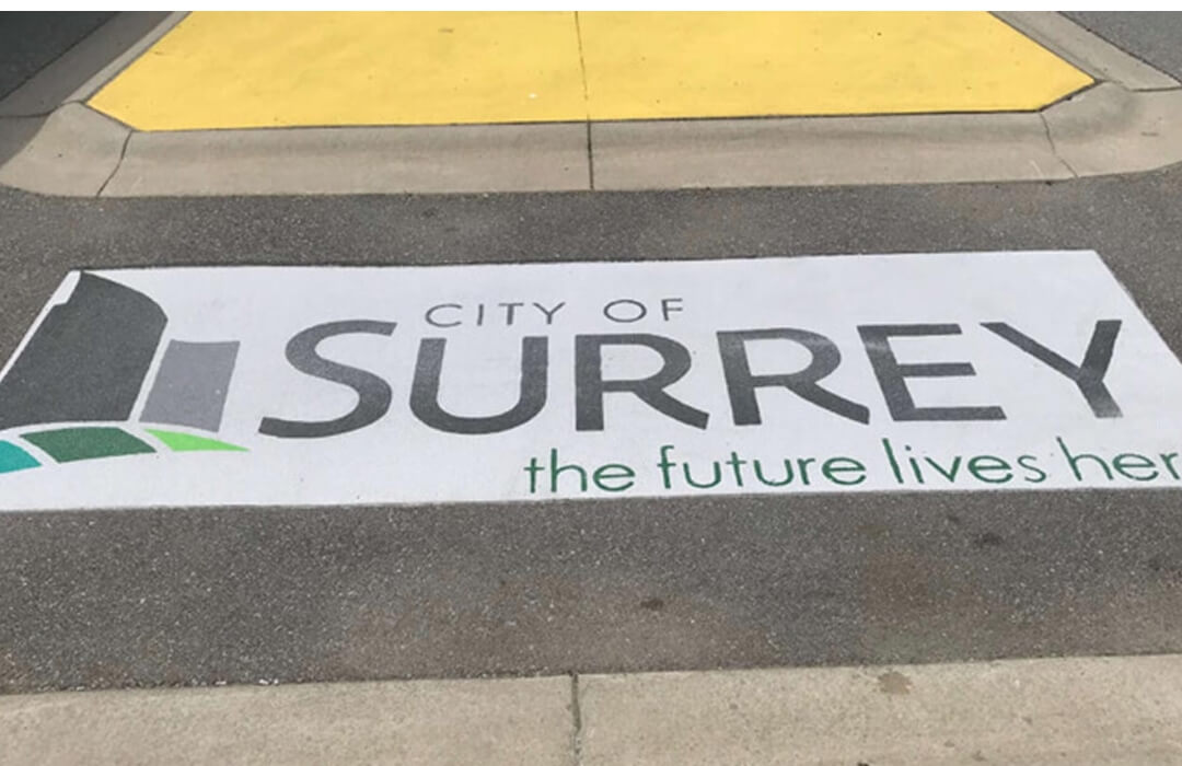 Community Branding with DecoMark on asphalt for Surrey BC Canada