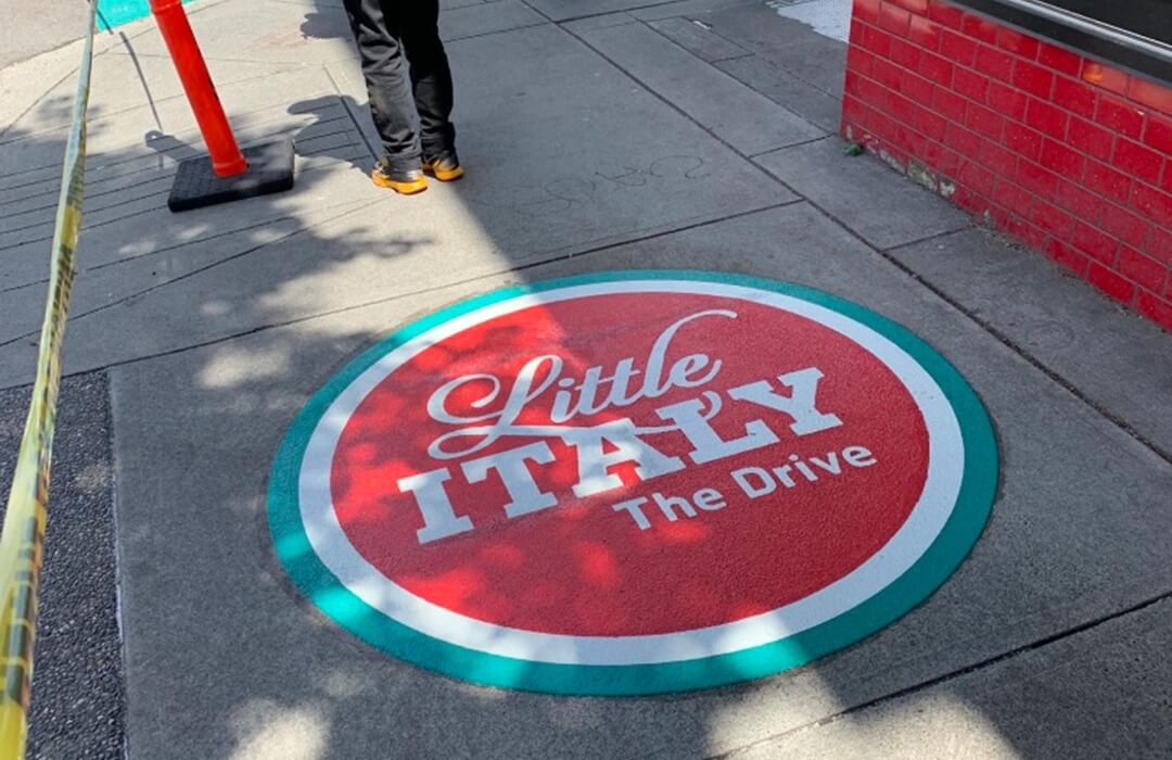 DecoMark on asphalt Little Italy Community Branding Commercial Drive Vancouver BC Canada