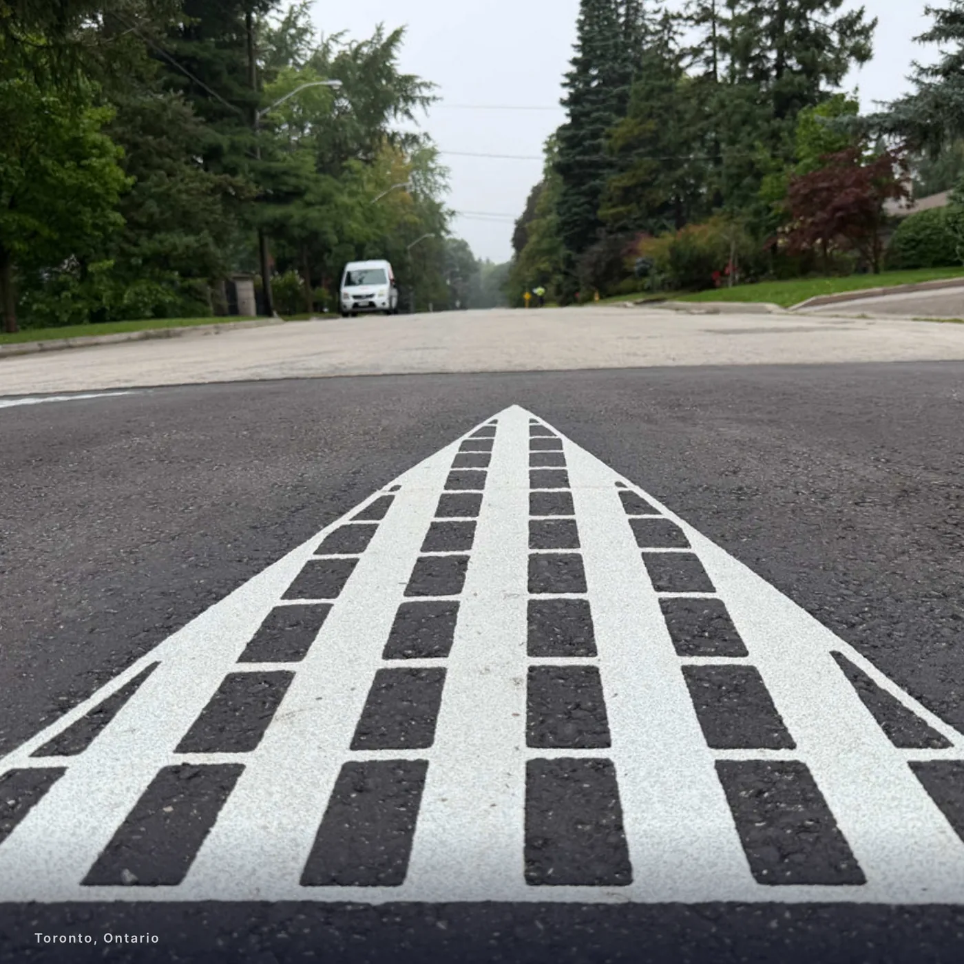 DuraTherm inlaid markings on a traffic-calmed street in Toronto, Ontario