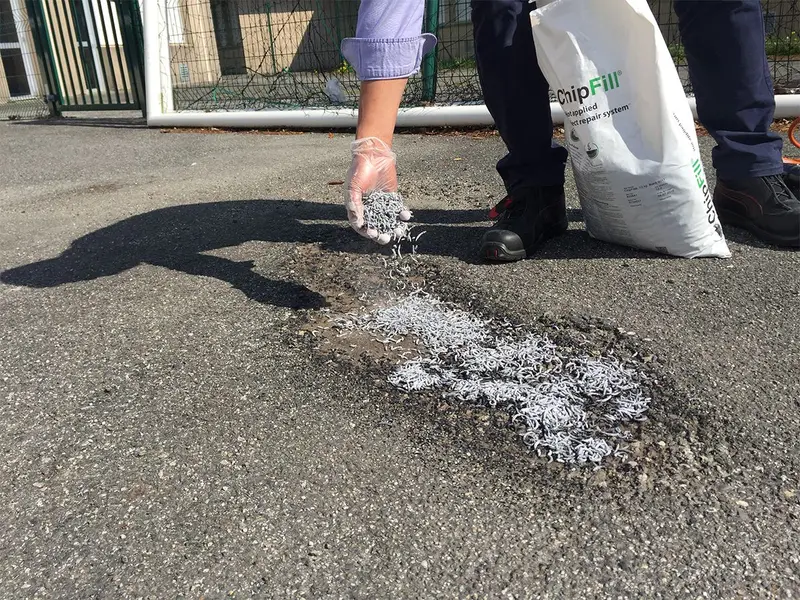 ChipFill poured from its bag into a pothole
