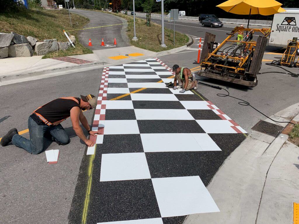 TrafficPatterns checkerboard crosswalk aspahlt installation